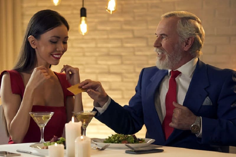 A couple discussing lifestyle goals in a sugar dating relationship